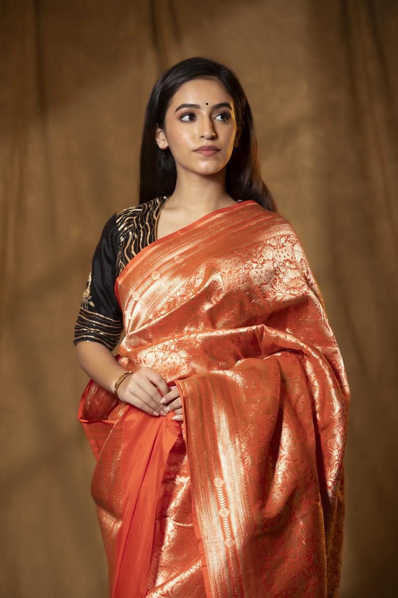 Orange Banarasi Katan Silk Saree with Pichwai Motif