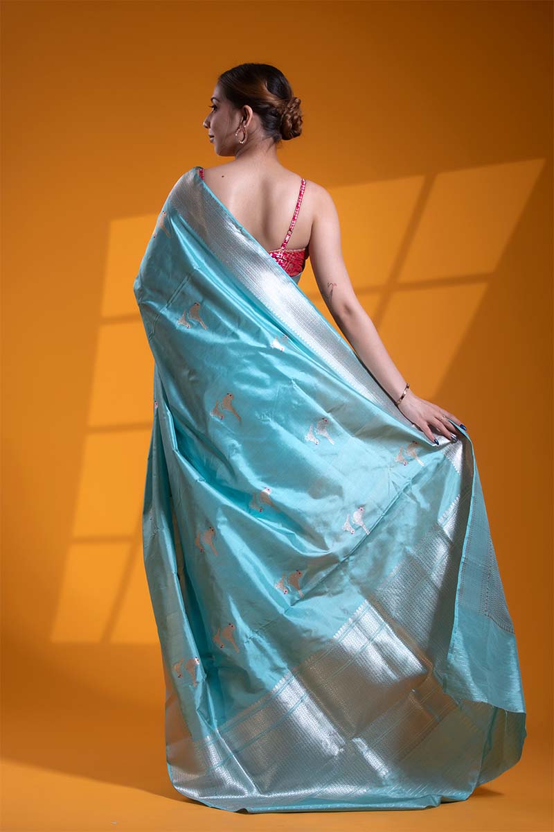 Cyan Blue Handloom Katan Silk Banarasi Saree with Silver Zari Bird Motifs