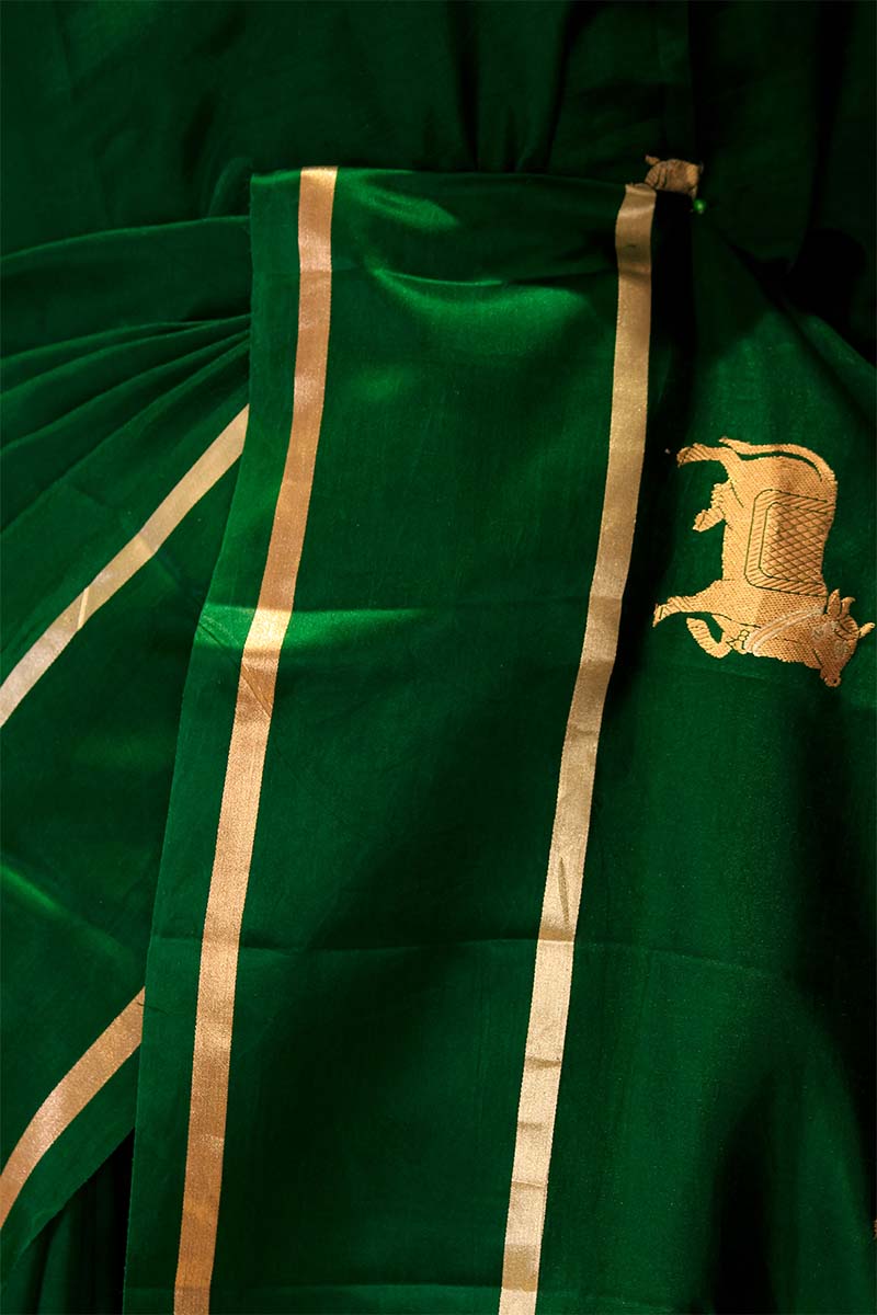 Bottle Green Puna Silk Banarasi Saree with Pichwai Aghanya Motifs