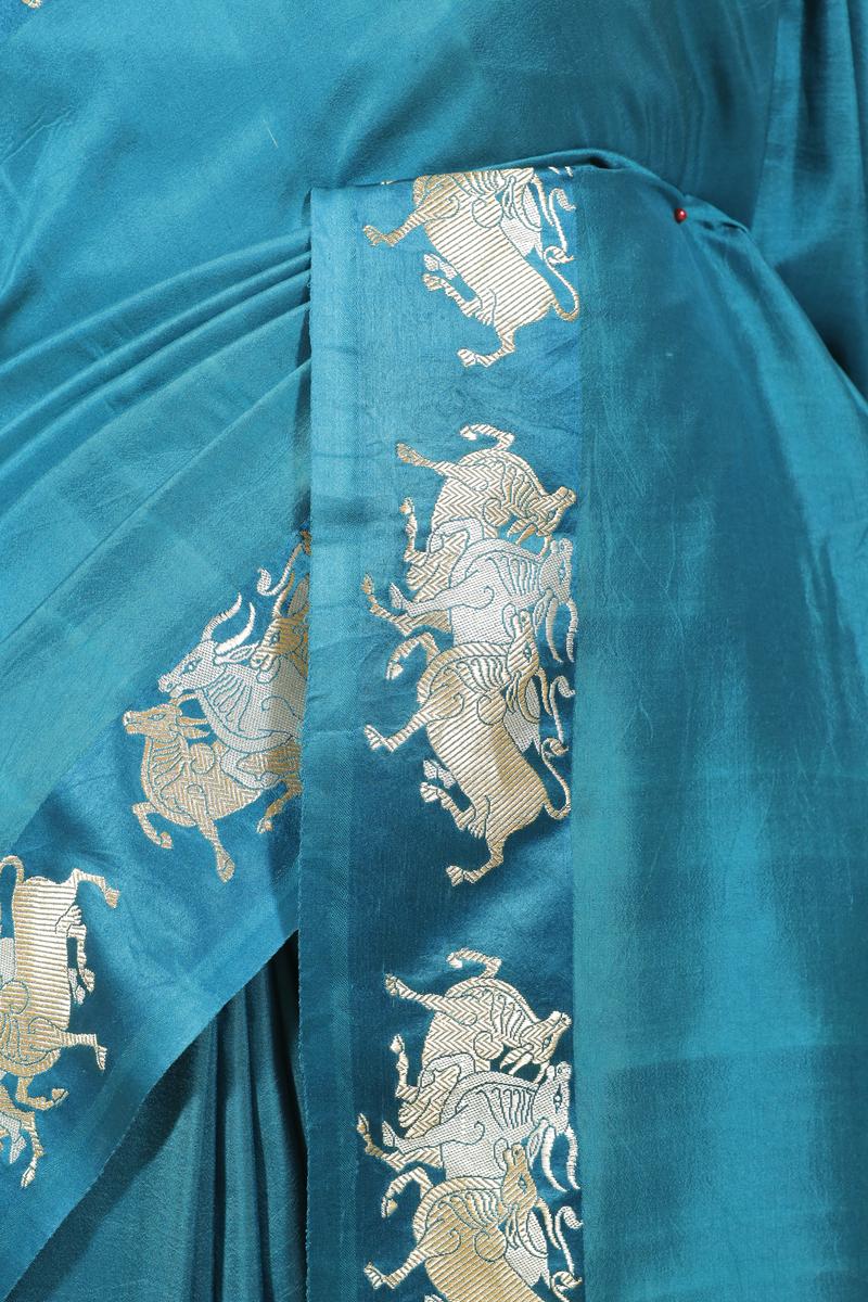 Teal Blue Handloom Banarasi Silk Saree with Vrishabha Motifs