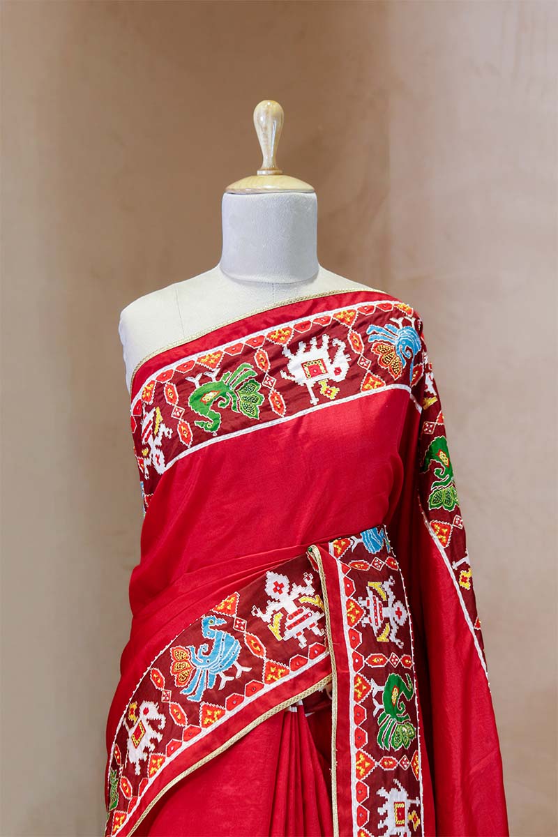 Nita Ambani Inspired Red Patola Saree with Radha-Krishna Embellished Blouse