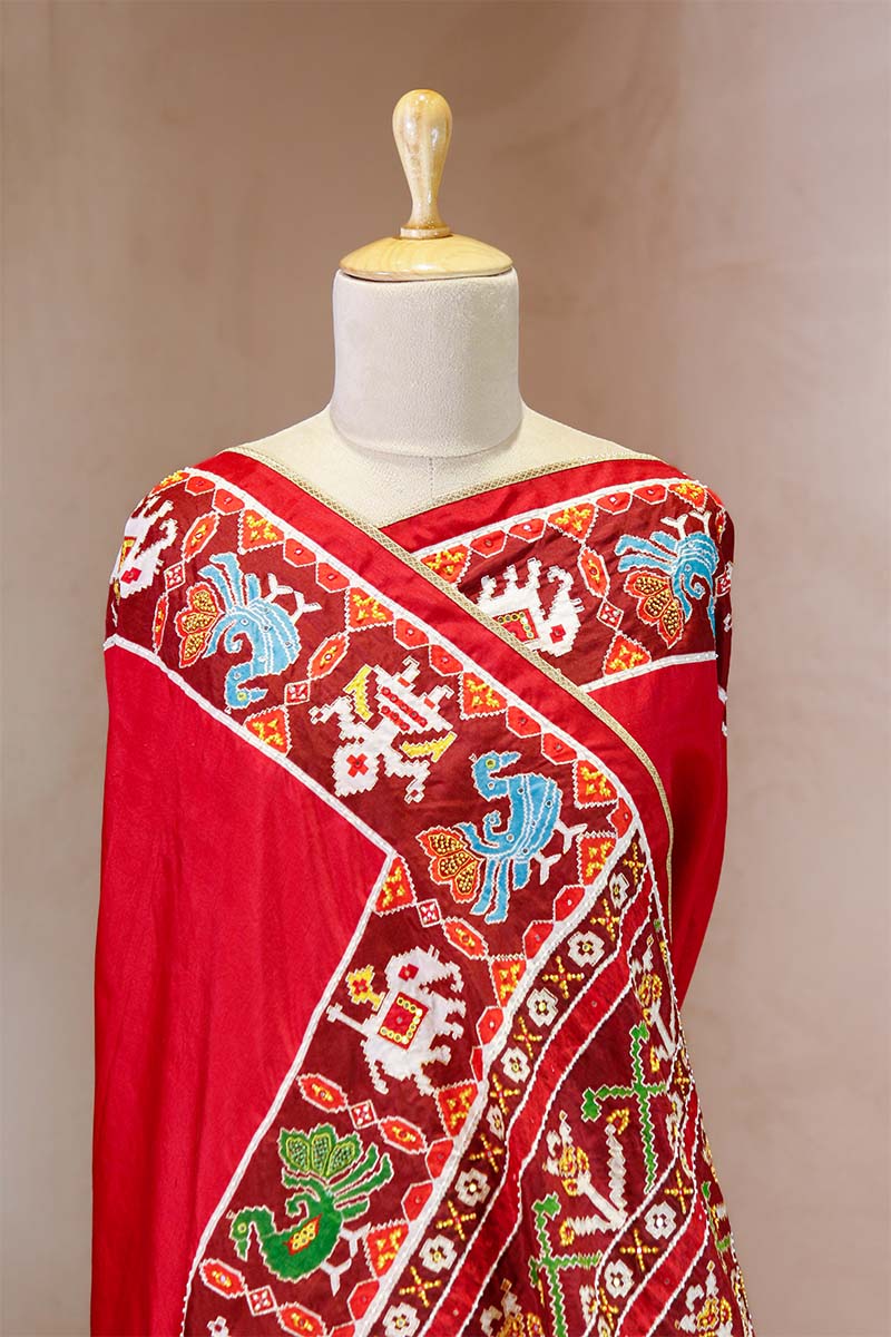 Nita Ambani Inspired Red Patola Saree with Radha-Krishna Embellished Blouse