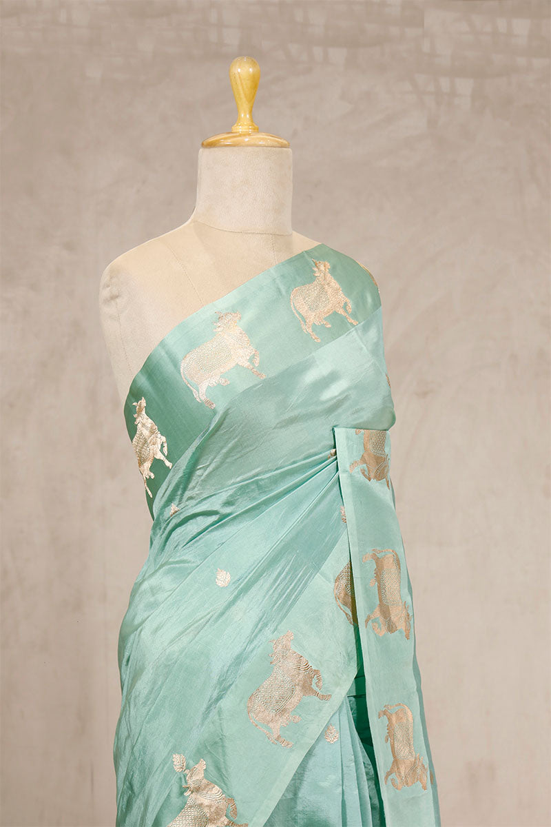 Aqua Blue Silk Banarasi Saree with Golden Zari Pichwai Motifs