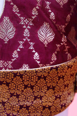 Deep Magenta Banarasi Blouse with Ethnic Motifs and Resham Embroidery