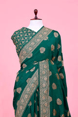 Bottle Green Crepe Banarasi Saree with Antique Zari Floral Motifs