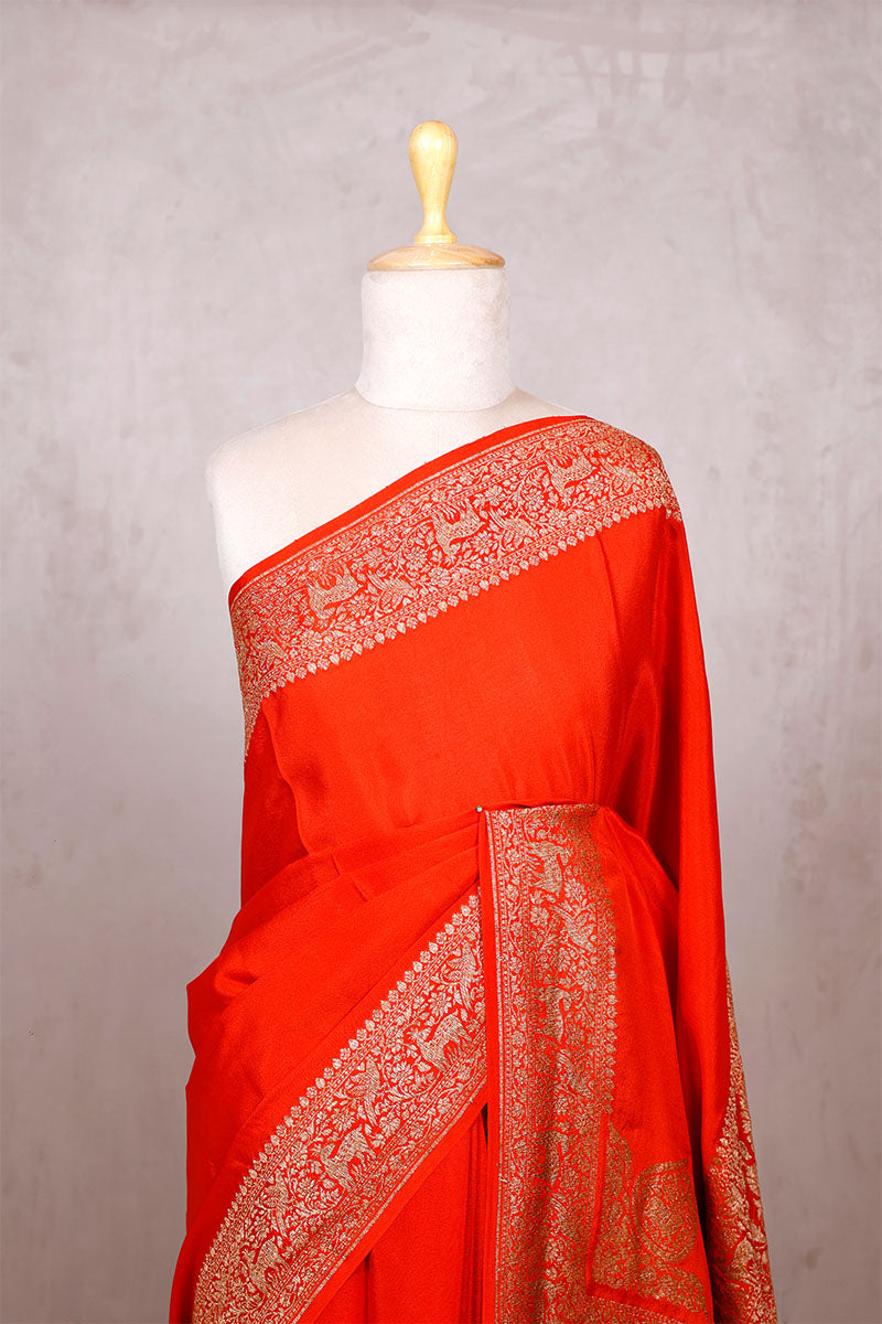 Red Orange Handloom Crepe Saree with Shikargah Zari Work