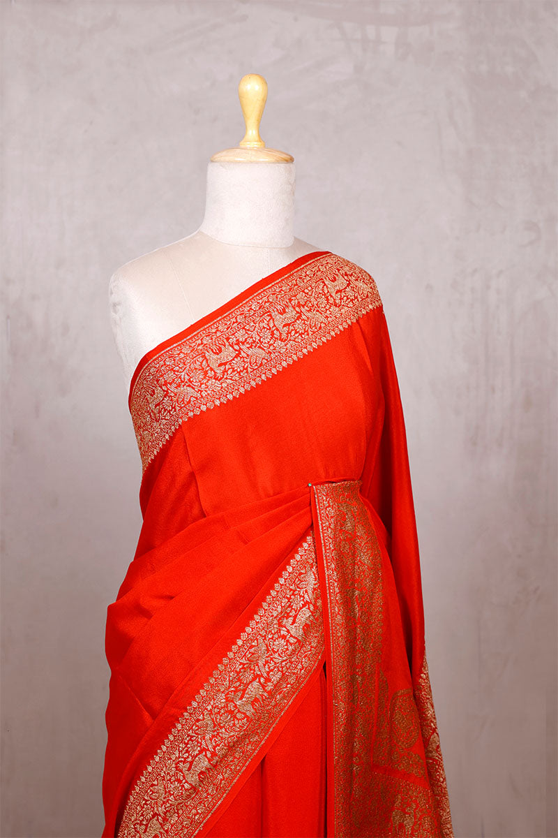 Red Orange Handloom Crepe Saree with Shikargah Zari Work