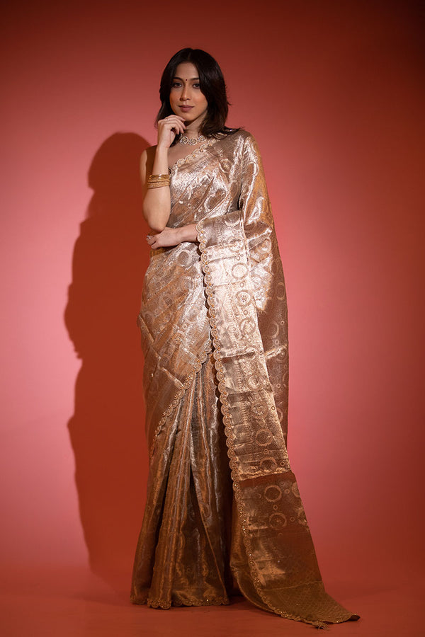 Women in Beige Gold Tissue Silk Saree at Chinaya Banaras