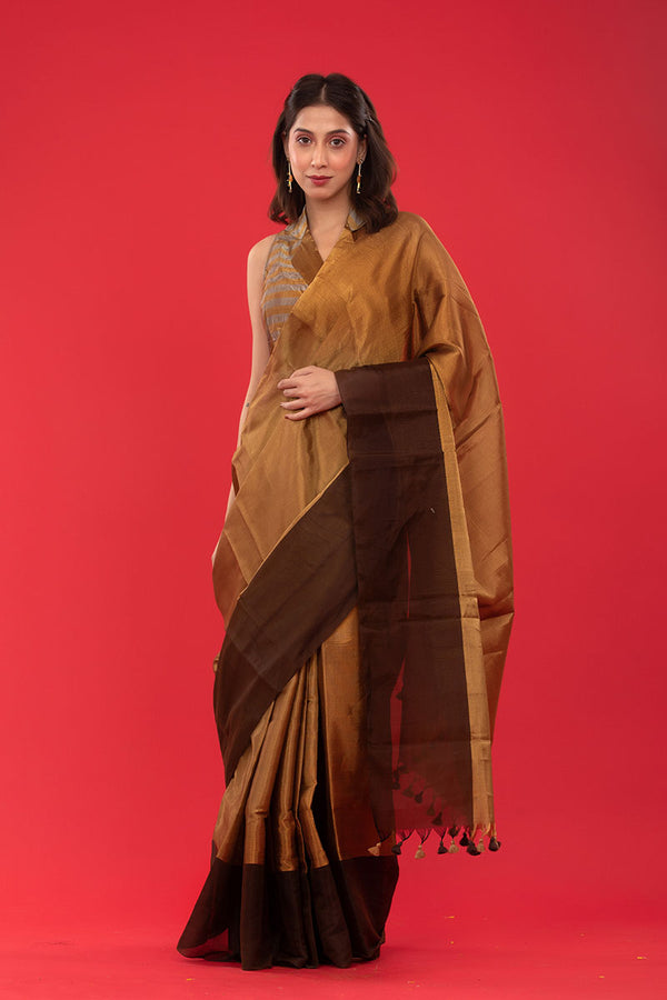 Women in Golden Tissue Silk Saree at Chinaya Banaras