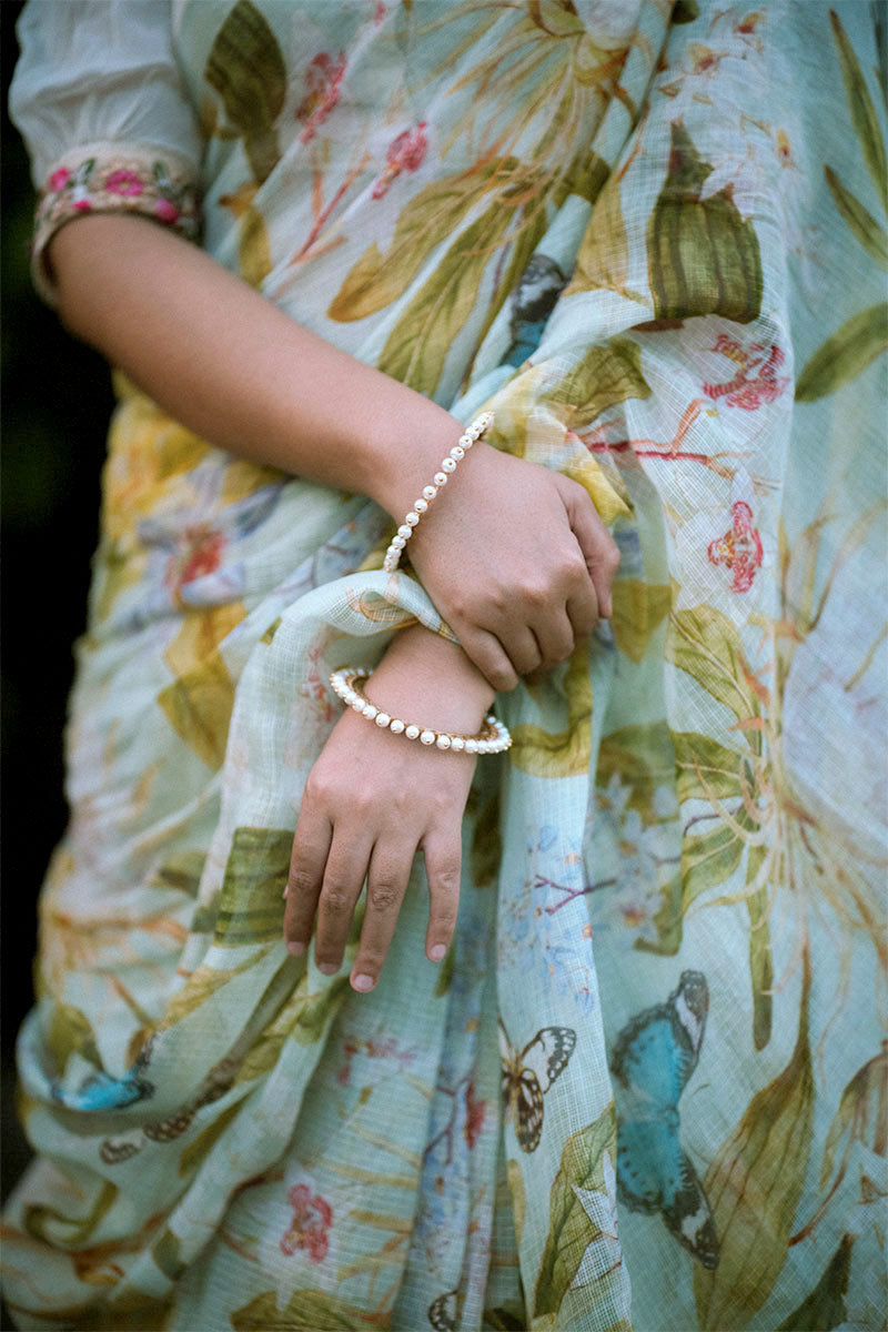 Ishita Debnath in Powder Blue Floral Printed Kota Doria Saree