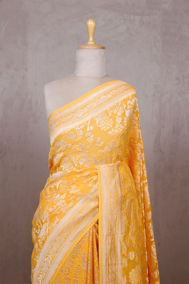 Yellow Georgette Khaddi Saree with Peacock Floral Work