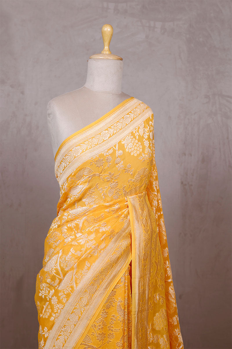 Yellow Georgette Khaddi Saree with Peacock Floral Work