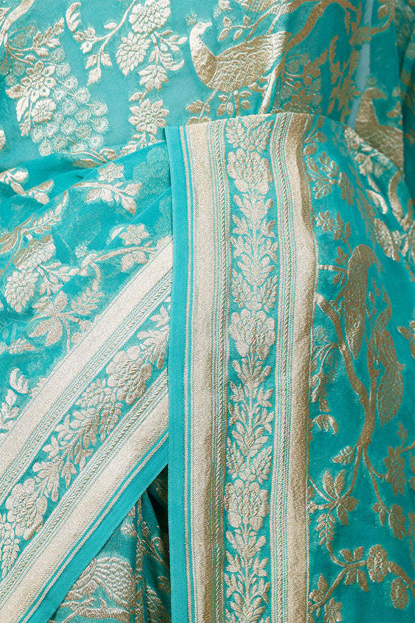 Sky Blue Georgette Khaddi Saree with Peacock Floral Work