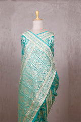 Sky Blue Georgette Khaddi Saree with Peacock Floral Work