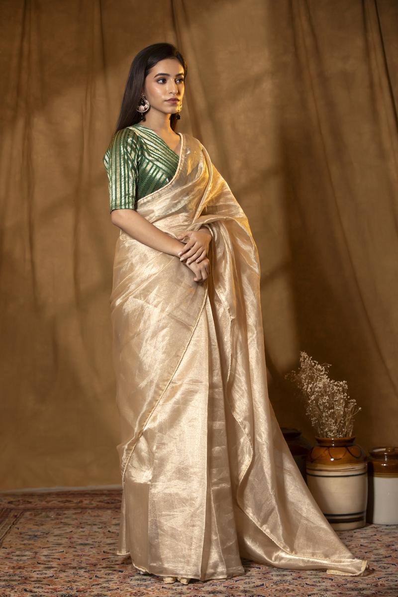 Beige Pure Tissue Saree with Pearl Embellished Border