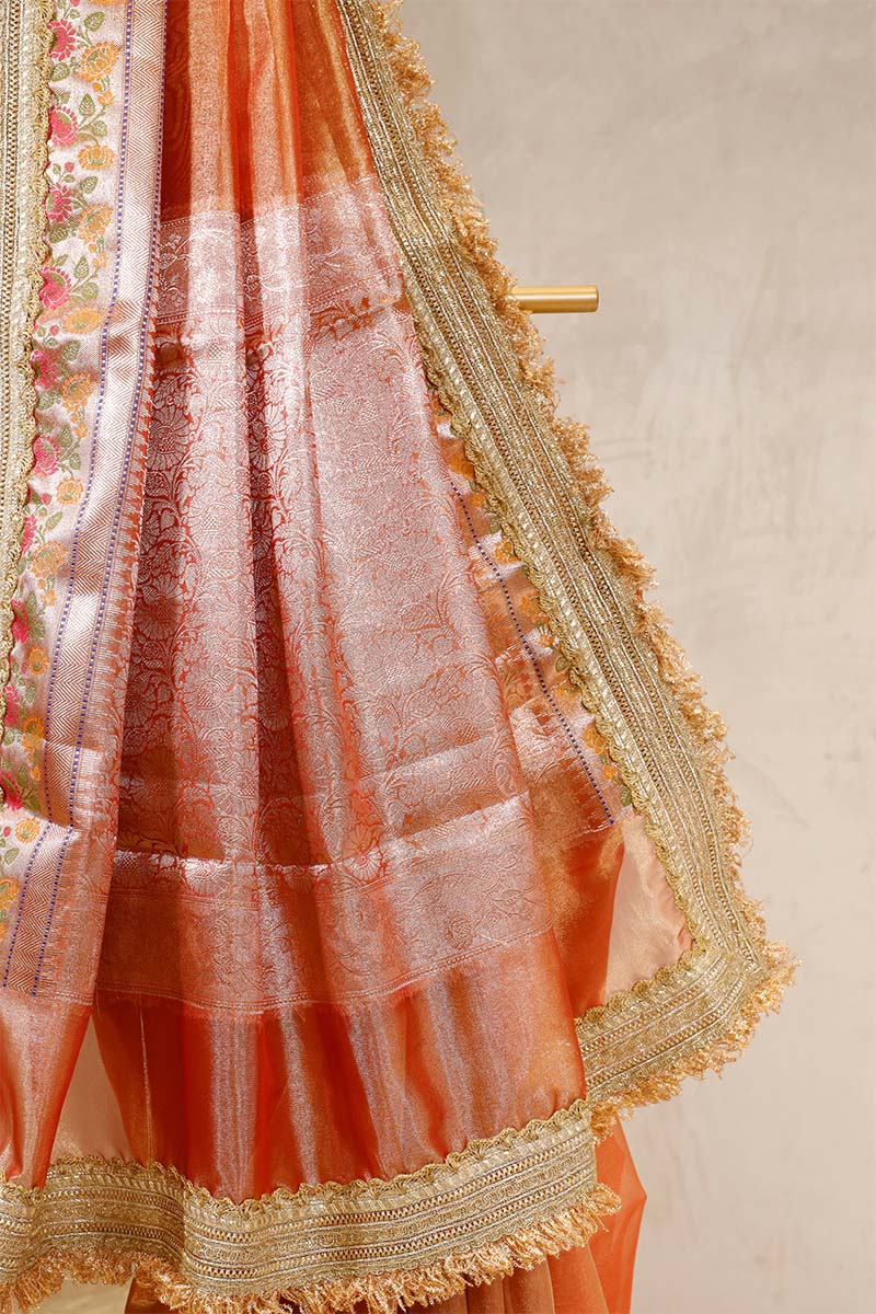 Rust Embellished Party Wear Tissue Silk Saree