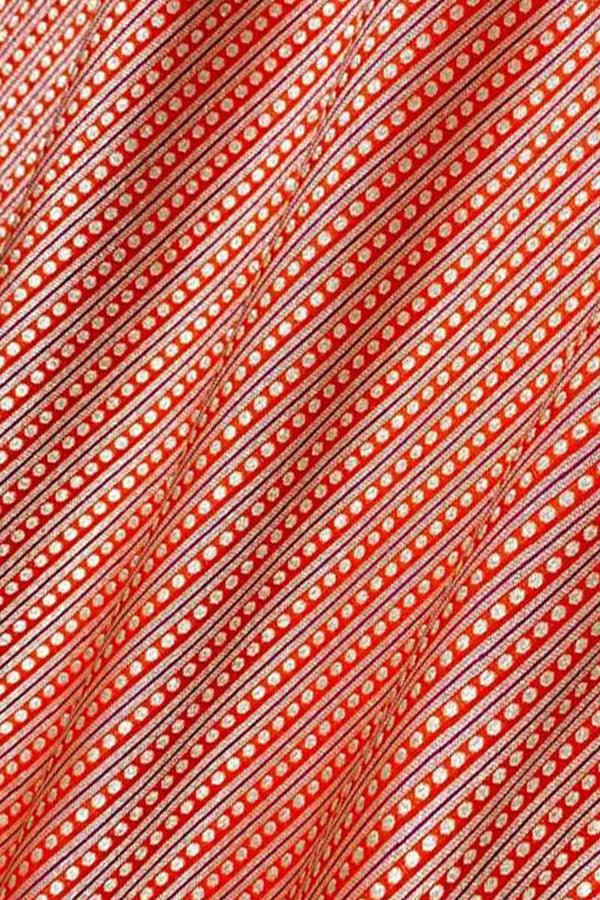 Orange fabric, banarasi fabric​, banarasi brocade fabric​, banarasi silk fabric​, banarasi fabric online​