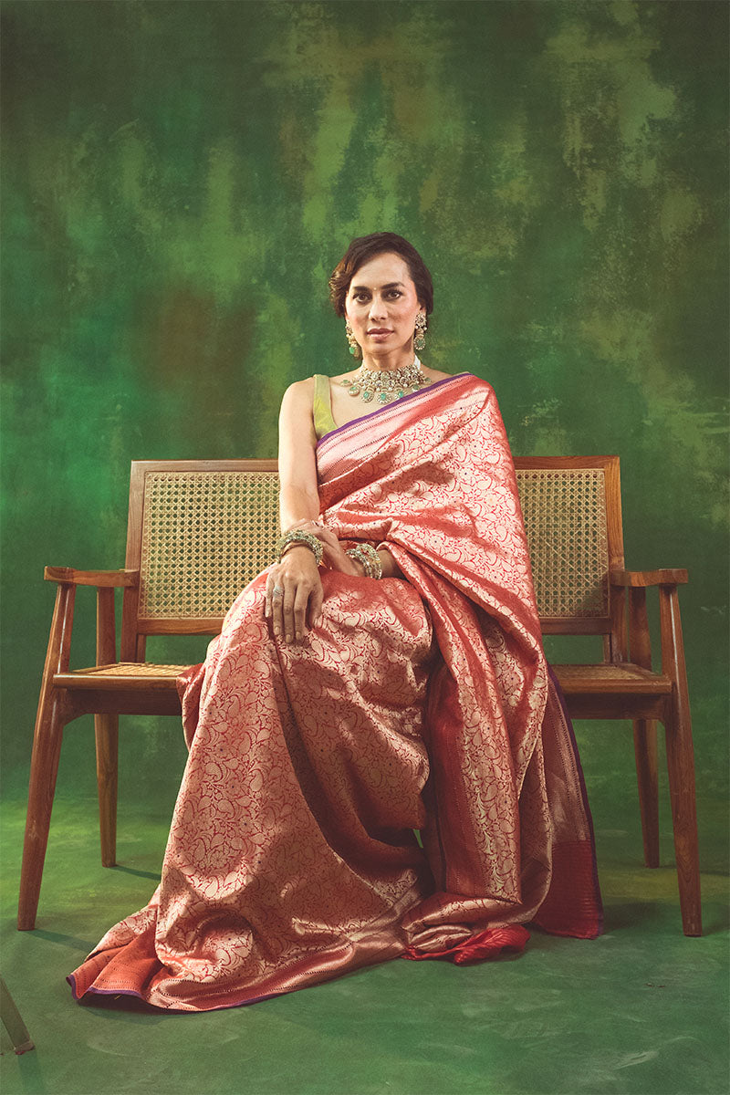 A woman sitting on a bench under a tree photo – Wedding saree Image on  Unsplash